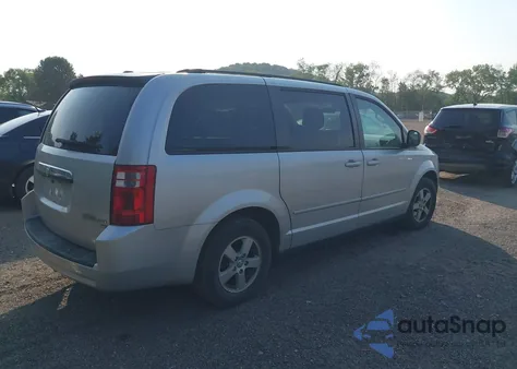 2010 Dodge Grand Caravan Hero z USA, uszkodzony, nr VIN 2D4RN3D1XAR450200